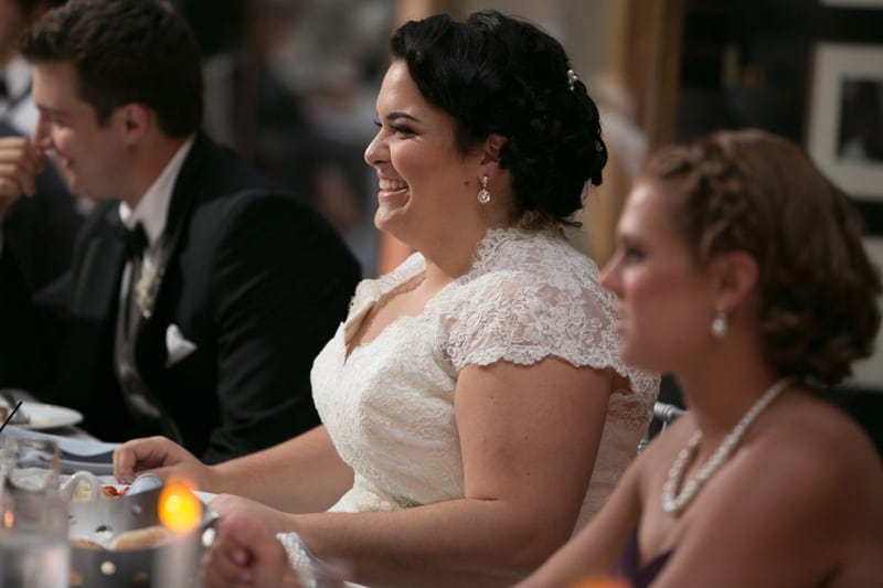 bride laughing at best man speech at cleveland arcade