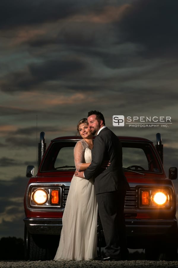 wedding picture by classic car at breitenbach