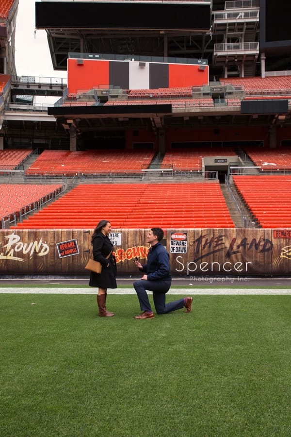 On one knee for his wedding proposal