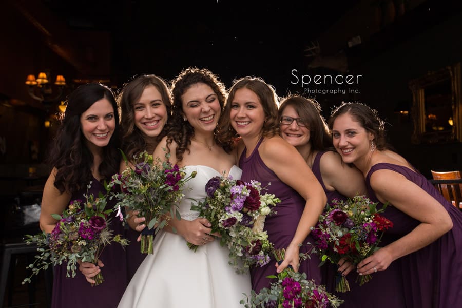 bridesmaids on wedding day outside of Baxters Akron