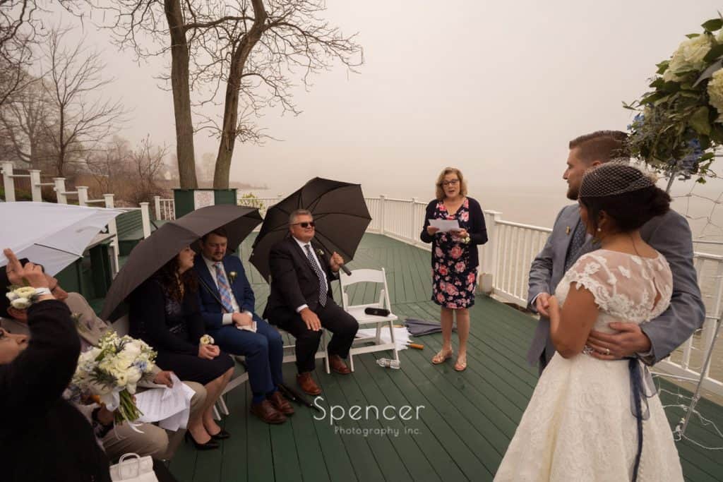 mother of groom sings at wedding ceremony