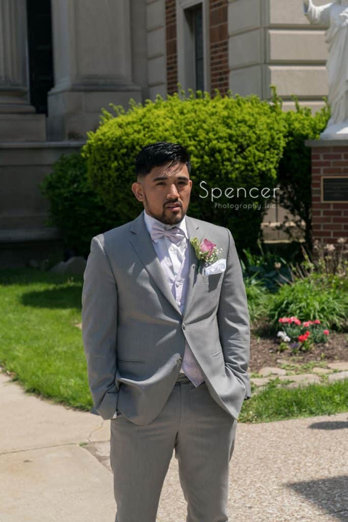 groom waiting for wedding day first look