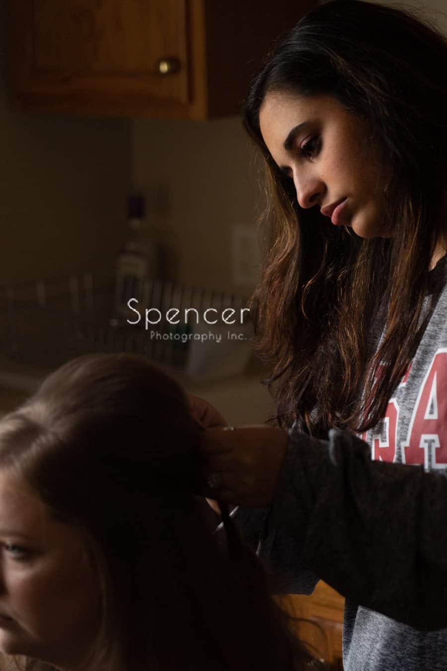 hair stylist helping Indiana Bride