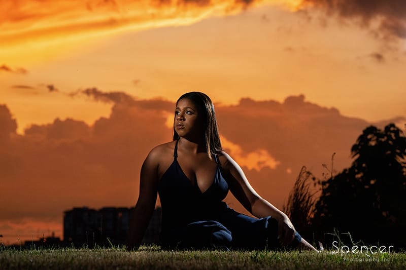 senior picture at sunset in front of Cleveland