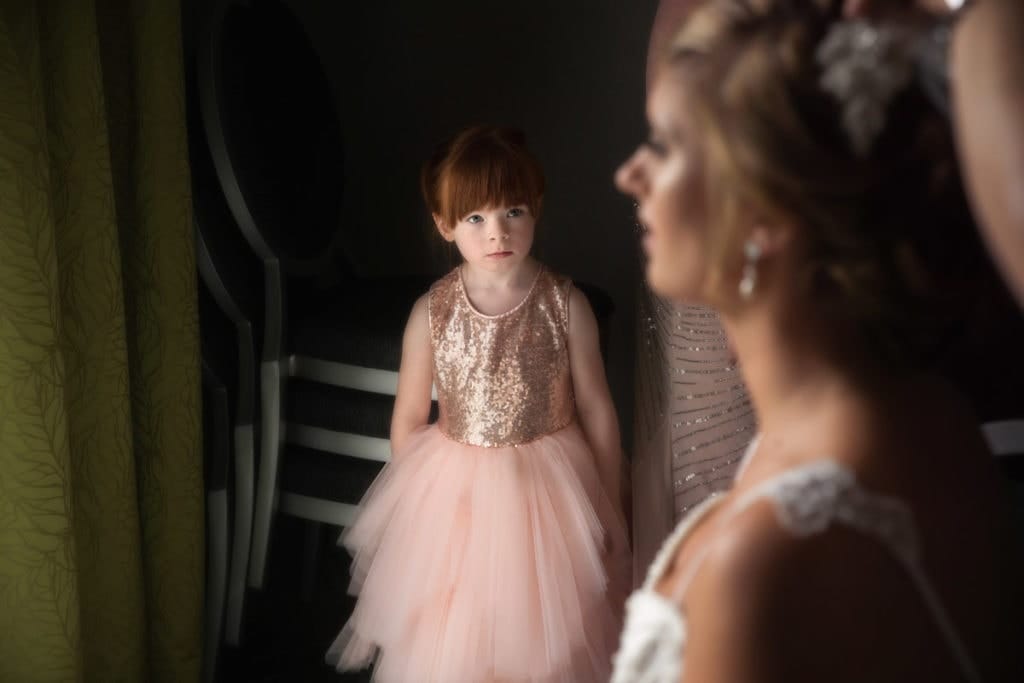 flower girl watching Cleveland bride put on veil