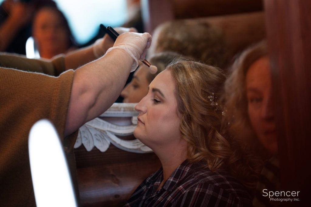 parker barn bride getting make-up