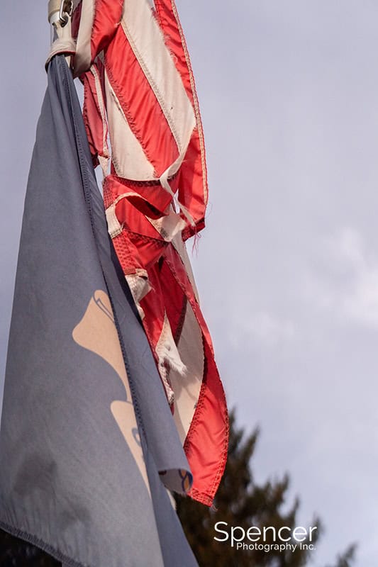 tattered US flag in Akron
