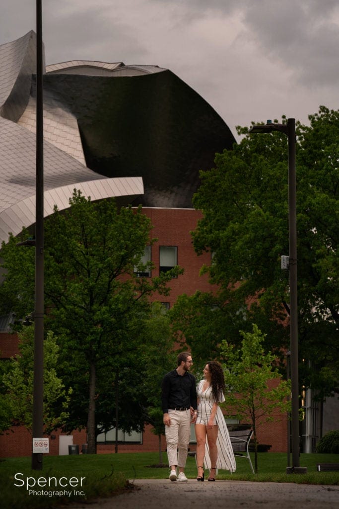 engagement picture of couple walking at Case Western Reserve University