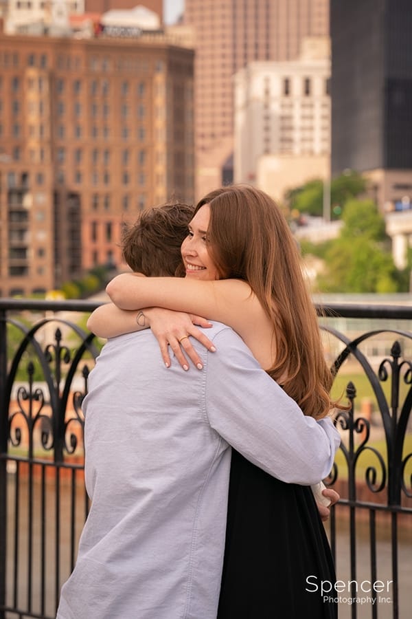 man proposes to woman in Cleveland West Bank