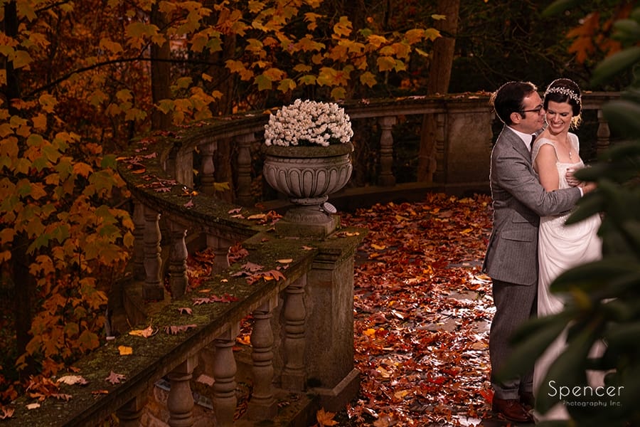 bride and groom on overlook at stan hywet