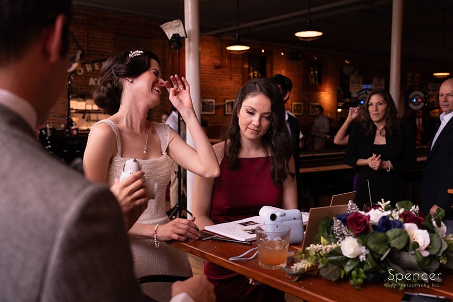 bride laughing at her unique wedding reception