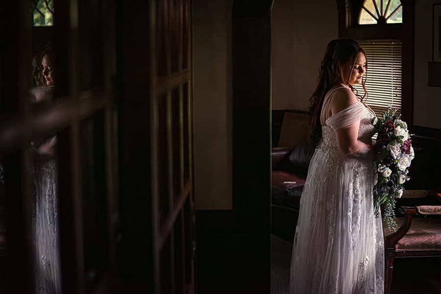 wedding picture of bride inside Stone Cottage at Hines Hill