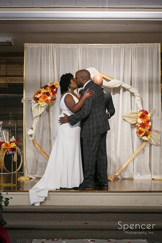first kiss at wedding ceremony